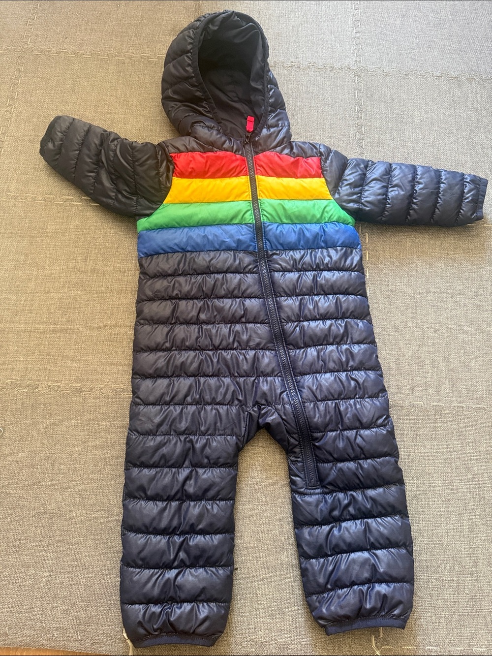 Primary Navy Puffer One-Piece with Red, Yellow, Green, and Blue Stripe